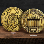 Side by side images of the front and back of a gold coin, on a wood table. The front view has an etched owl motif. The back has "Gotham Knights Season One" around the edge, with a courthouse motif etched in the center. A black background sits behind the coins.